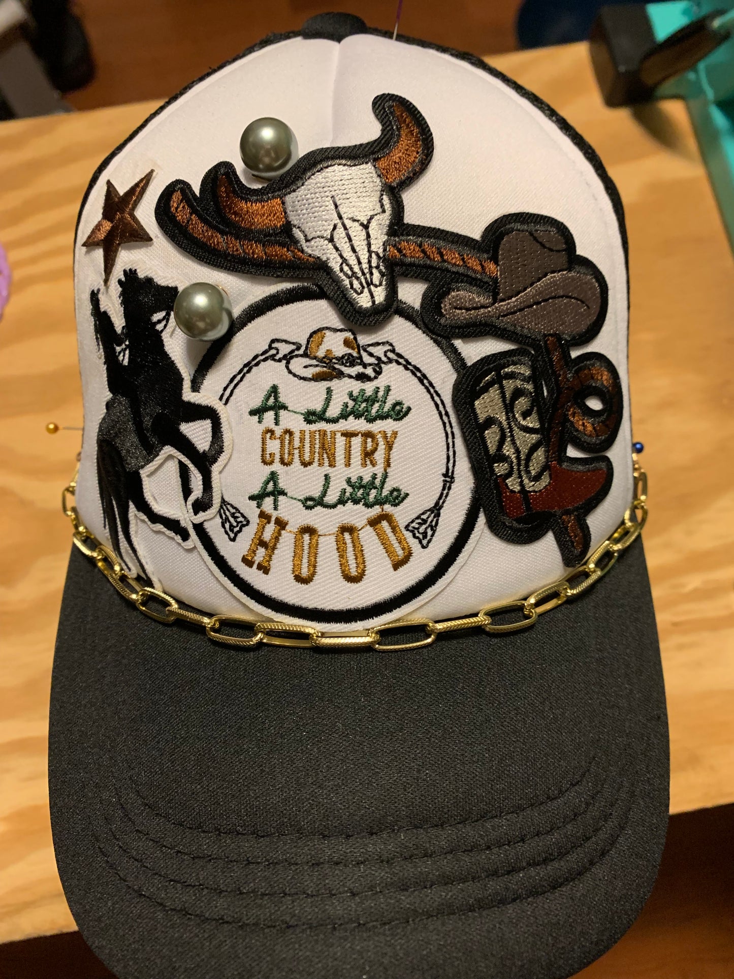 Tucker hat with unlimited patches